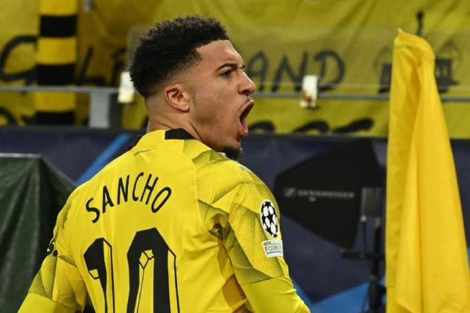 Sancho mừng bàn trong trận Dortmund thắng PSV 2-0 ở lượt về vòng 1/8 Champions League hôm 13/3 tại Đức. Ảnh: Reuters