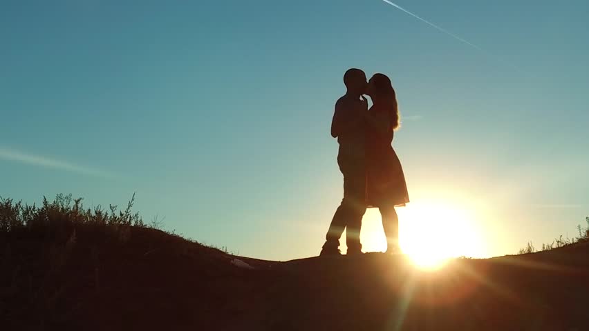 Couple at Sunset Kiss